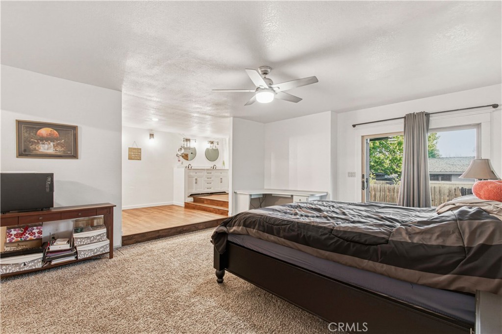 1908 Chelwood Way Modesto, CA 95355 - Photo 27 of 44 a bedroom with a bed dresser and a window