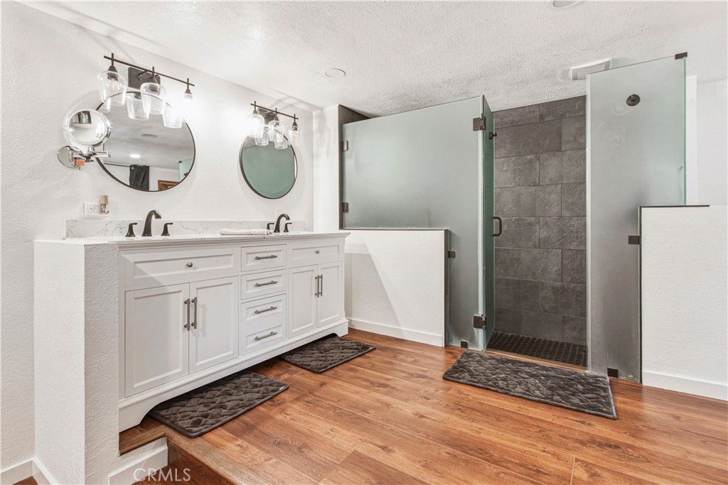 1908 Chelwood Way Modesto, CA 95355 - Photo 31 of 44 a spacious bathroom with a double vanity sink mirror and shower