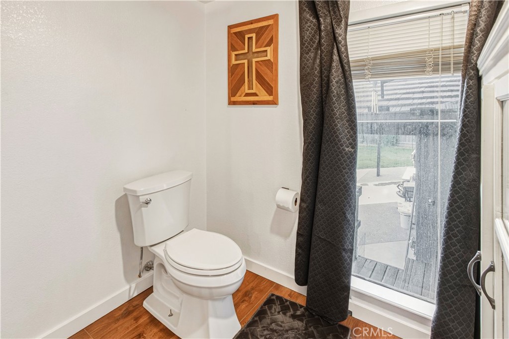 1908 Chelwood Way Modesto, CA 95355 - Photo 32 of 44 a white toilet sitting next to a shower