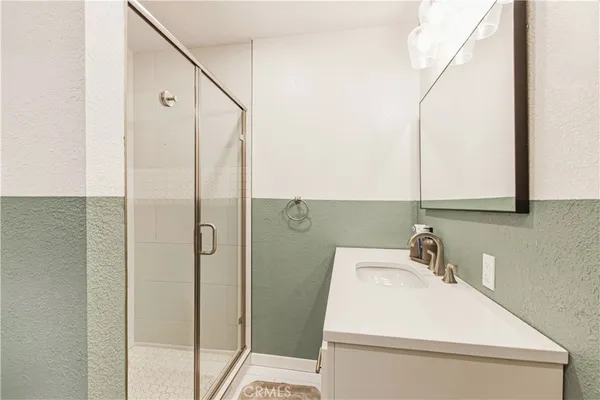 a bathroom with a toilet and a sink