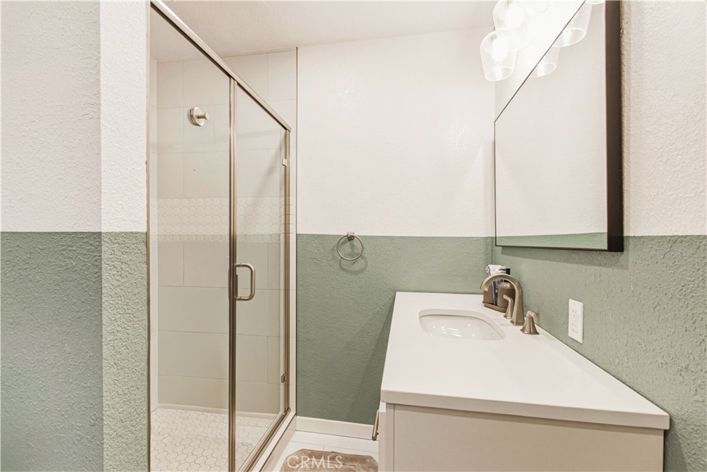 1908 Chelwood Way Modesto, CA 95355 - Photo 37 of 44 a bathroom with a sink a toilet and shower