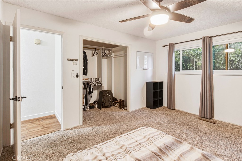 1908 Chelwood Way Modesto, CA 95355 - Photo 40 of 44 a view of a room with closet and a ceiling fan