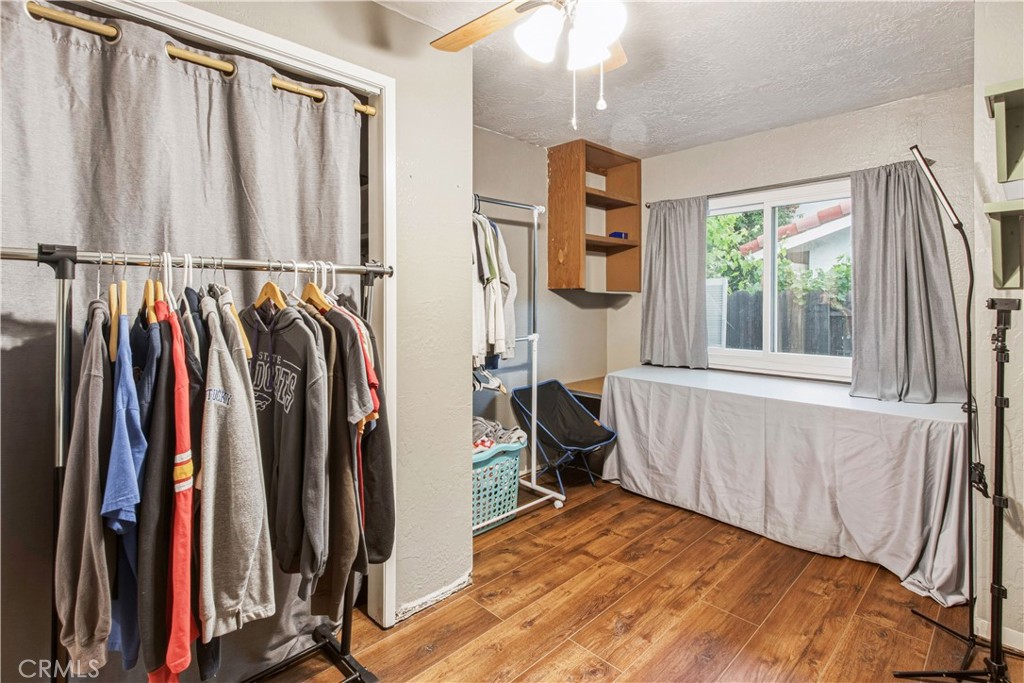 1908 Chelwood Way Modesto, CA 95355 - Photo 41 of 44 a view of walk in closet with clothes and shoes