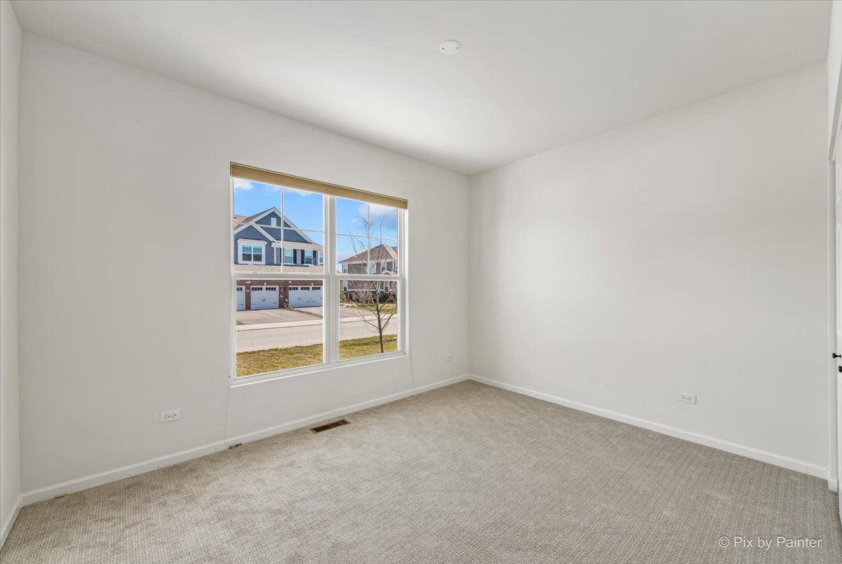 23116 Pinehurst Drive Kildeer, IL 60047 - Photo 18 of 27 an empty room with windows