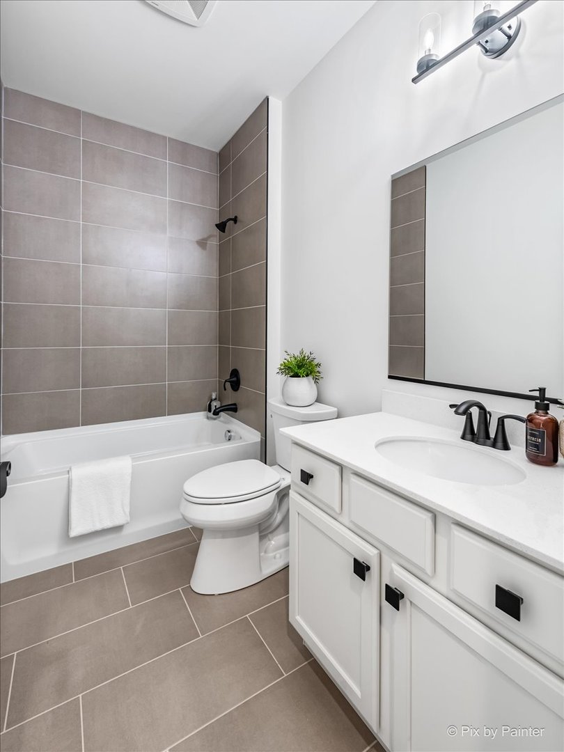 23116 Pinehurst Drive Kildeer, IL 60047 - Photo 19 of 27 a bathroom with a sink a toilet and shower