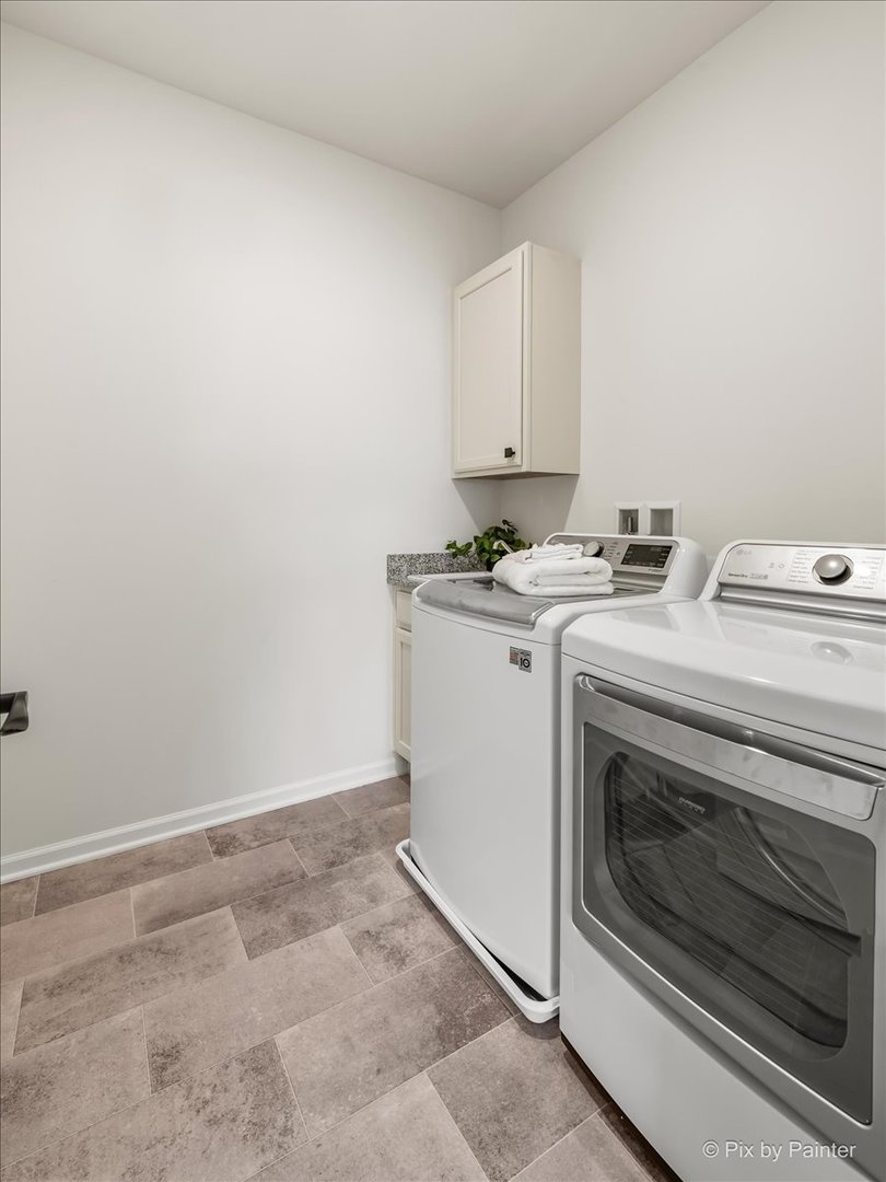 23116 Pinehurst Drive Kildeer, IL 60047 - Photo 20 of 27 a utility room with dryer and washer