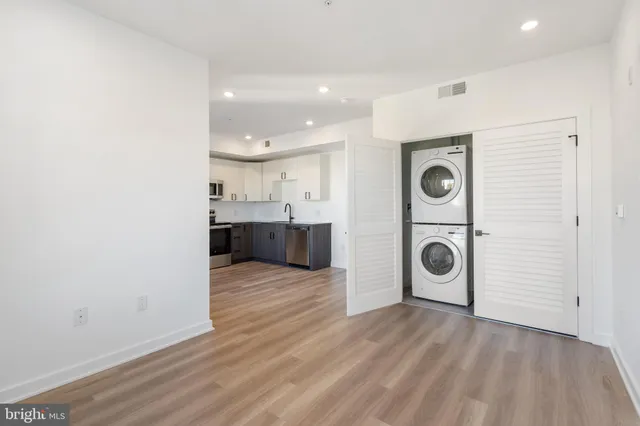 a view of a storage & utility room with washer and dryer
