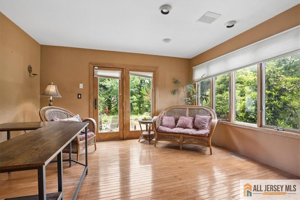167 Federal Road Monroe Township, NJ 08831 - Photo 17 of 46 a living room with furniture and a large window