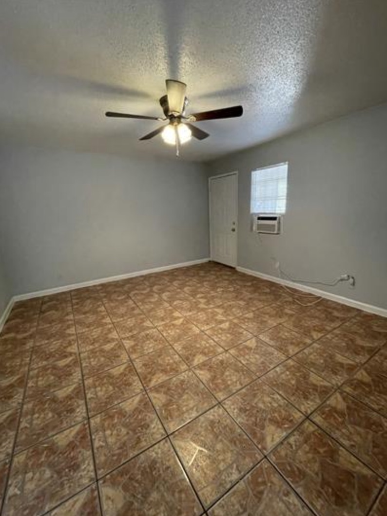 105 Cockerham Street, Unit A Kyle, TX 78640 - Photo 1 of 9 a view of an empty room