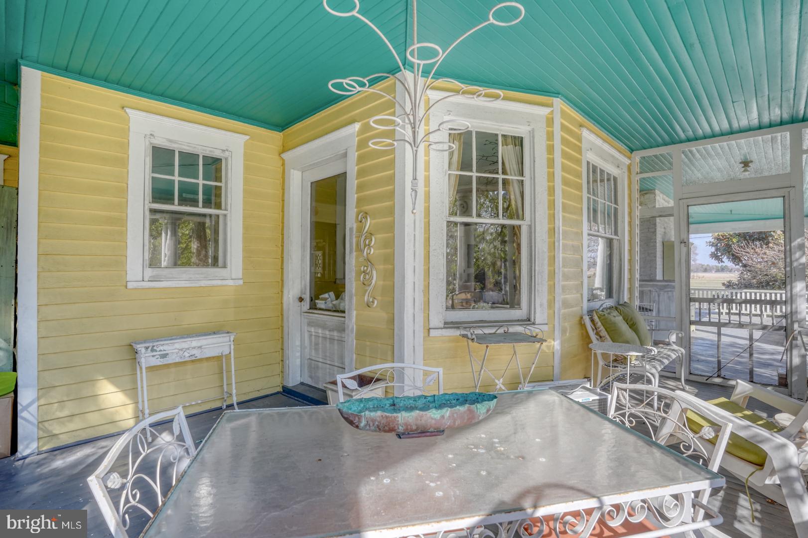 4096 Main Street Trappe, MD 21673 - Photo 61 of 70 a front view of a house with outdoor seating
