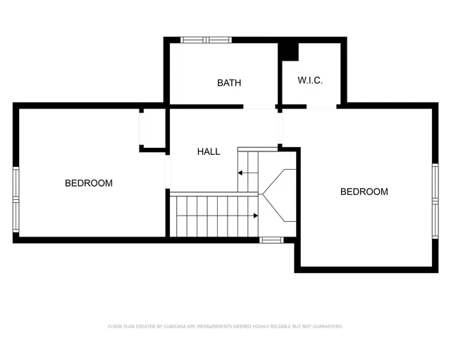 a picture of a bench in a white building