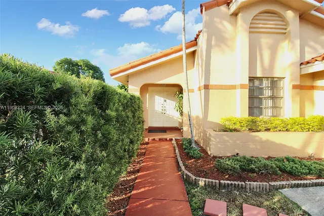 a view of a garden with pathway