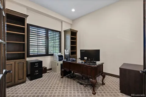 a room with furniture and a flat screen tv