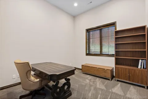 a view of a livingroom with furniture