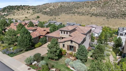 an aerial view of a house with a garden