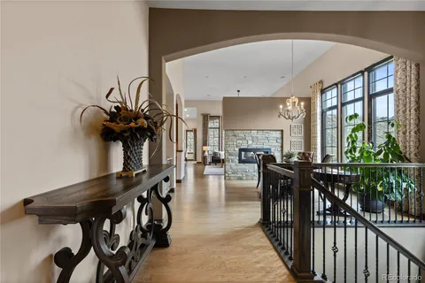 a view of a livingroom with furniture and hardwood floor
