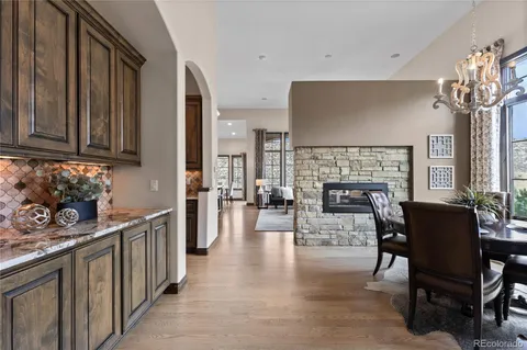 a view of a kitchen and dining room
