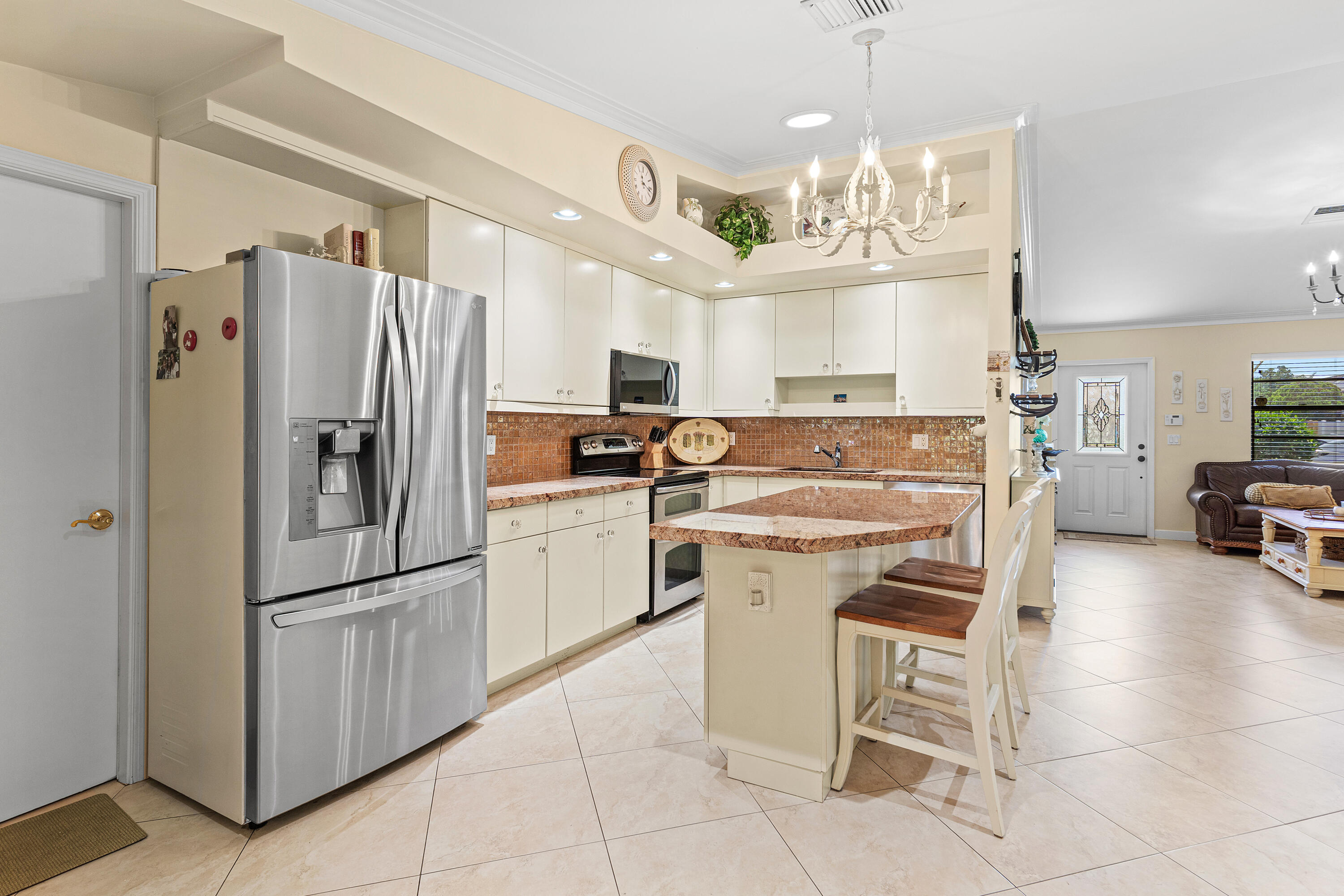 5175 Beechwood Road Delray Beach, FL 33484 - Photo 11 of 26 Centralized open kitchen