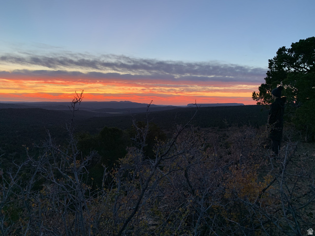 39 Upper Lick Road, Unit 39 Kanab, UT 84741 - Photo 36 of 44 Expansive landscape featuring distant mountains and a vibrant horizon