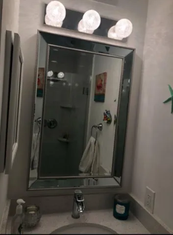 a room with lots of wooden furniture and clutter