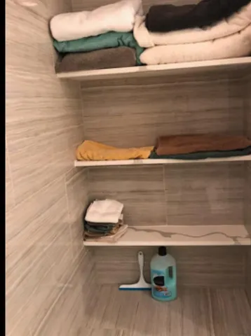 a view of a livingroom with wooden floor