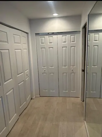 a dinning table sitting in a kitchen and kitchen island