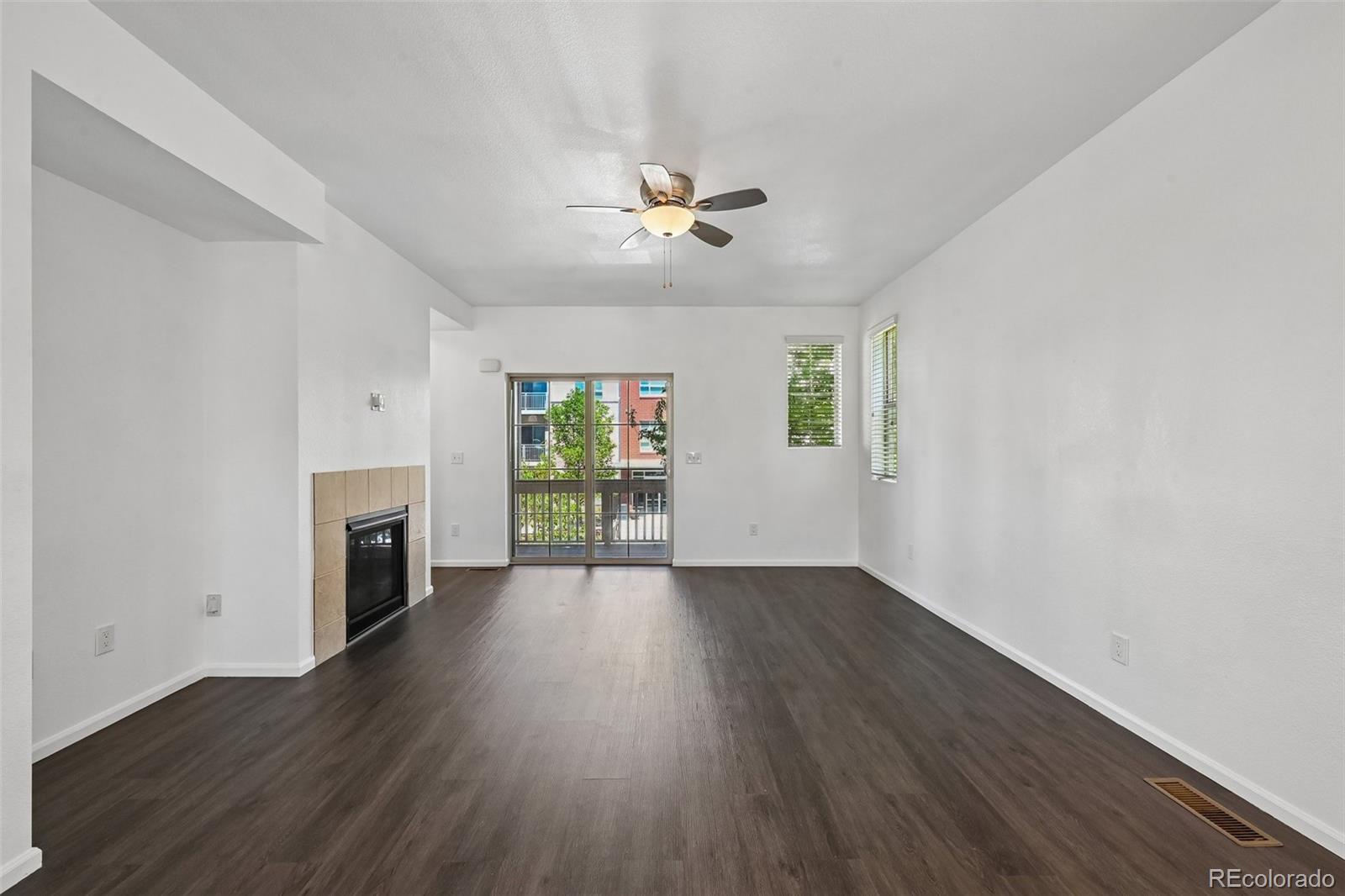 9520 Halstead Lane Lone Tree, CO 80124 - Photo 4 of 29 wooden floor in an empty room with a window