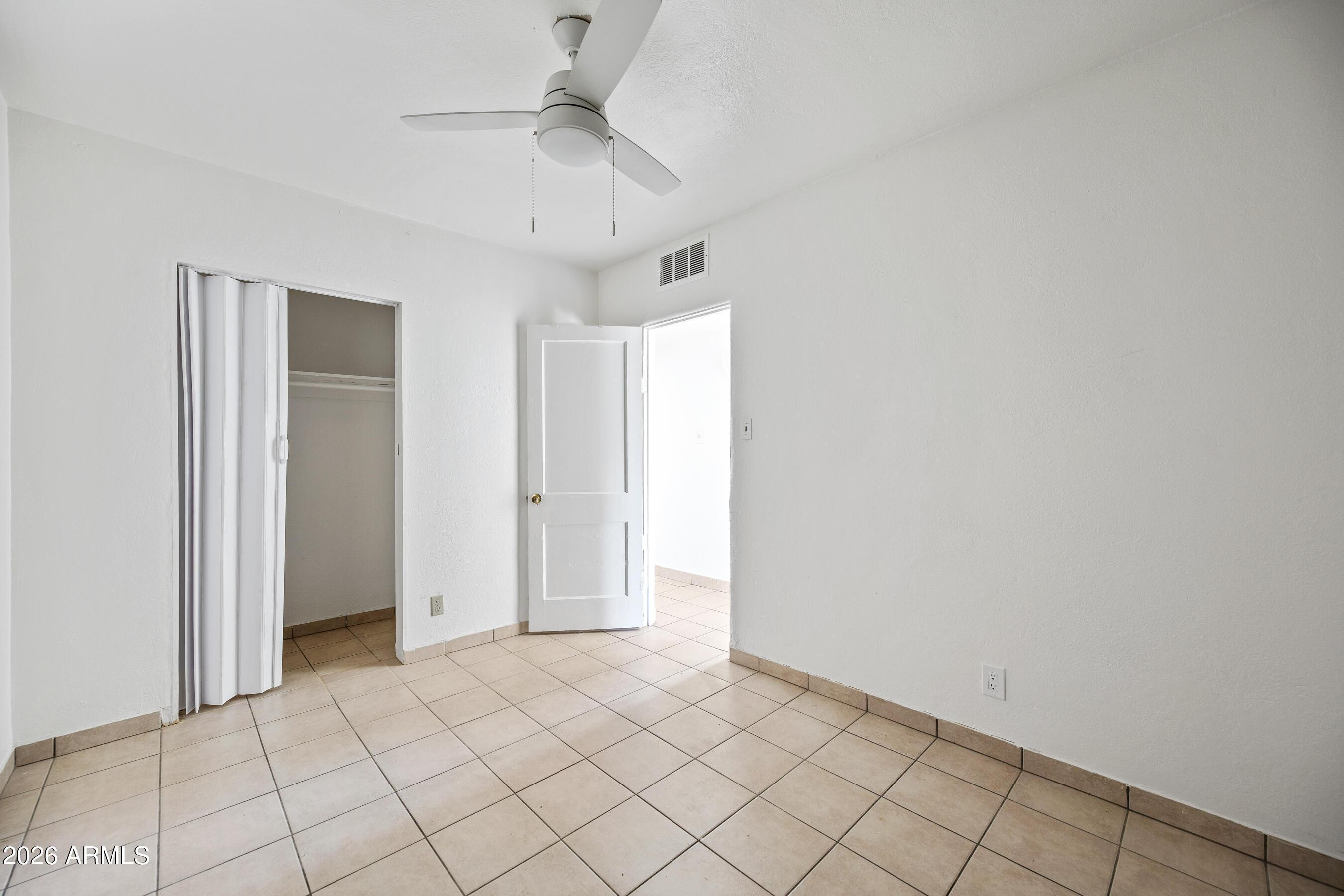 3903 North 12th Street Phoenix, AZ 85014 - Photo 12 of 16 a view of an empty room and window