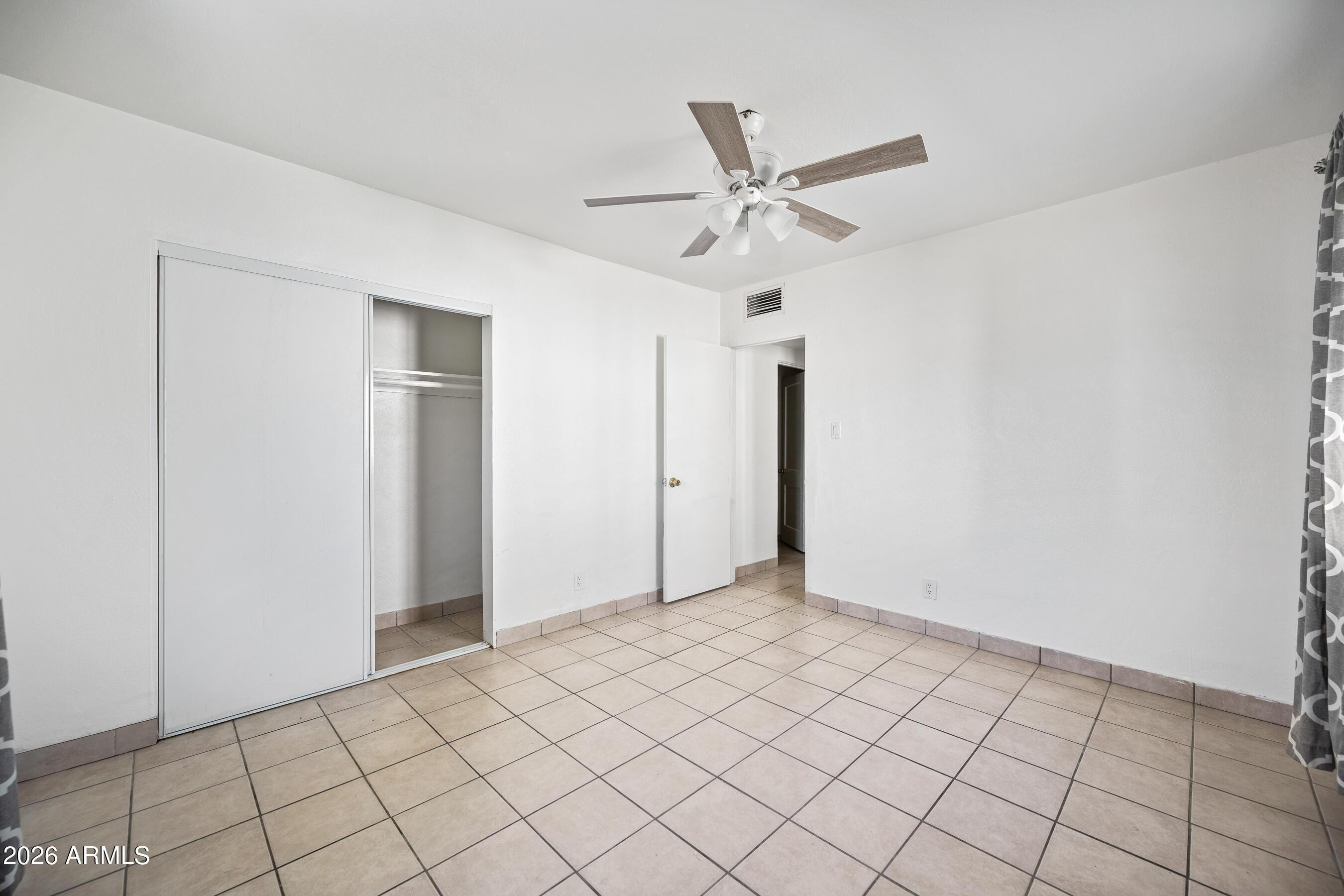 3903 North 12th Street Phoenix, AZ 85014 - Photo 10 of 16 a view of an empty room
