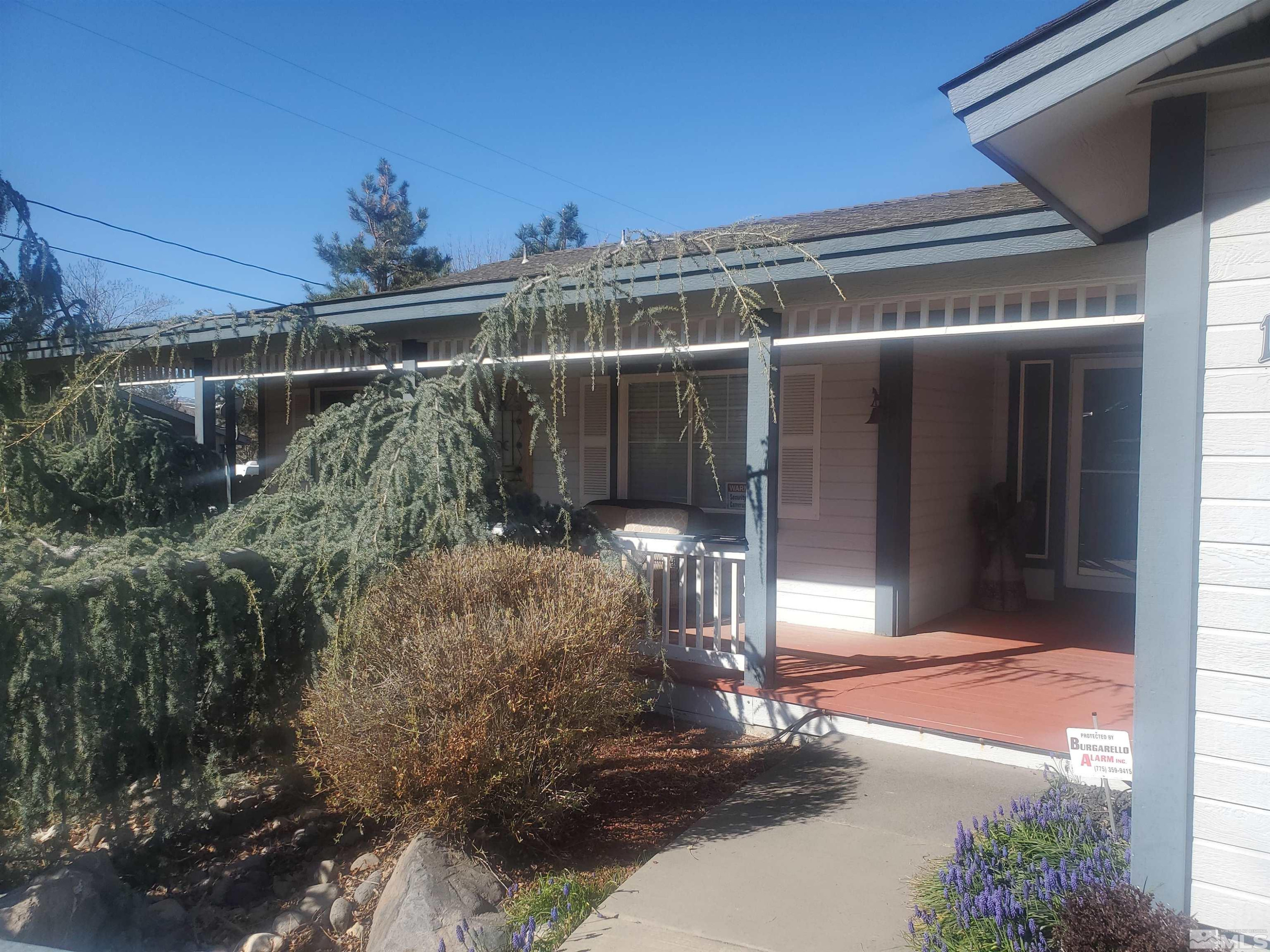 14465 Rim Rock Drive Reno, NV 89521 - Photo 1 of 2 a view of a porch