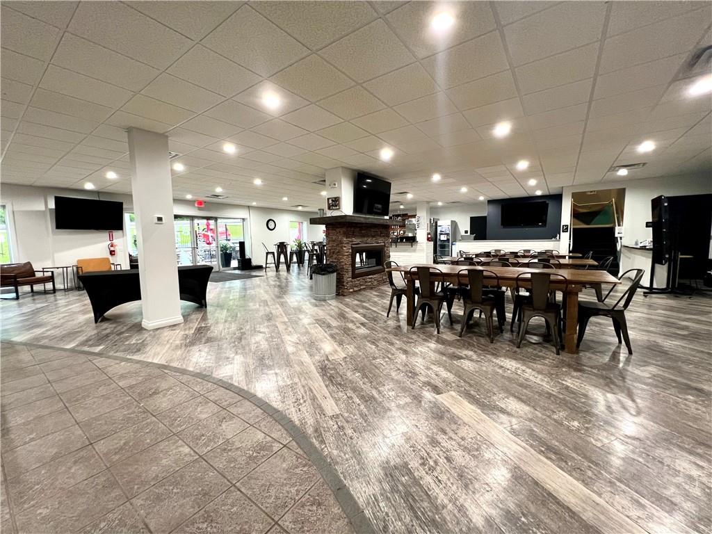 550 West George Street Carmichaels, PA 15320 - Photo 11 of 50 a living room with lots of furniture and a view of kitchen