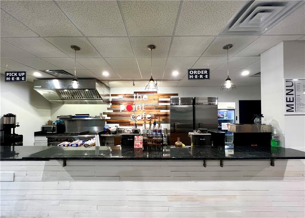 550 West George Street Carmichaels, PA 15320 - Photo 14 of 50 a room with lots of appliances and furniture