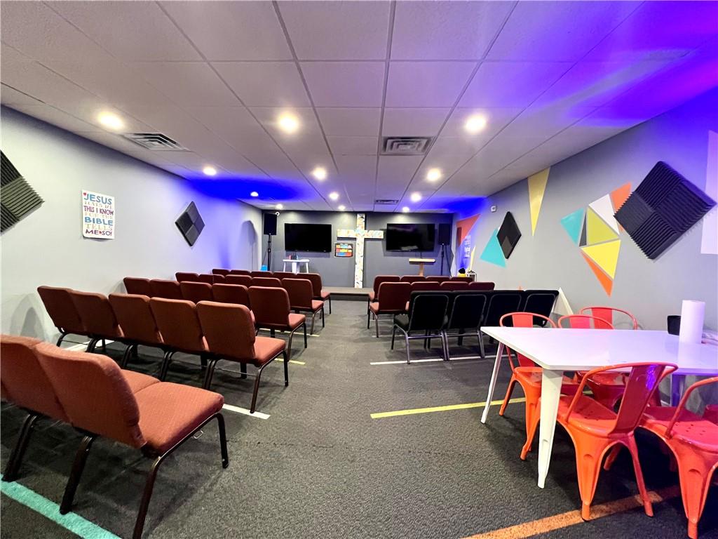 550 West George Street Carmichaels, PA 15320 - Photo 37 of 50 a living room with furniture a pool table and a fireplace