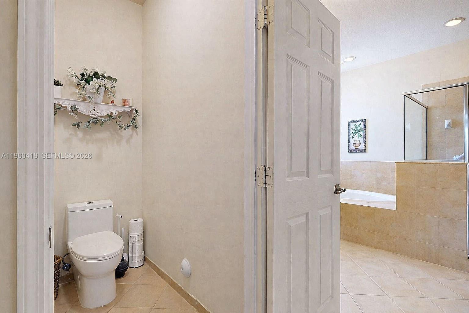 132 Northeast 26th Avenue Homestead, FL 33033 - Photo 35 of 68 a bathroom with a toilet a sink and shower