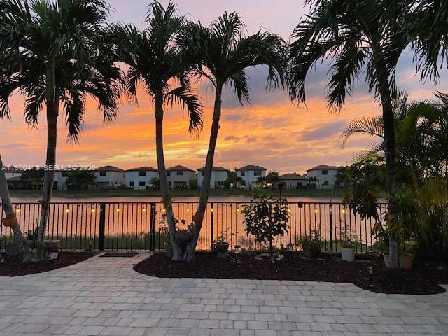 132 Northeast 26th Avenue Homestead, FL 33033 - Photo 5 of 68 a lake view with palm trees
