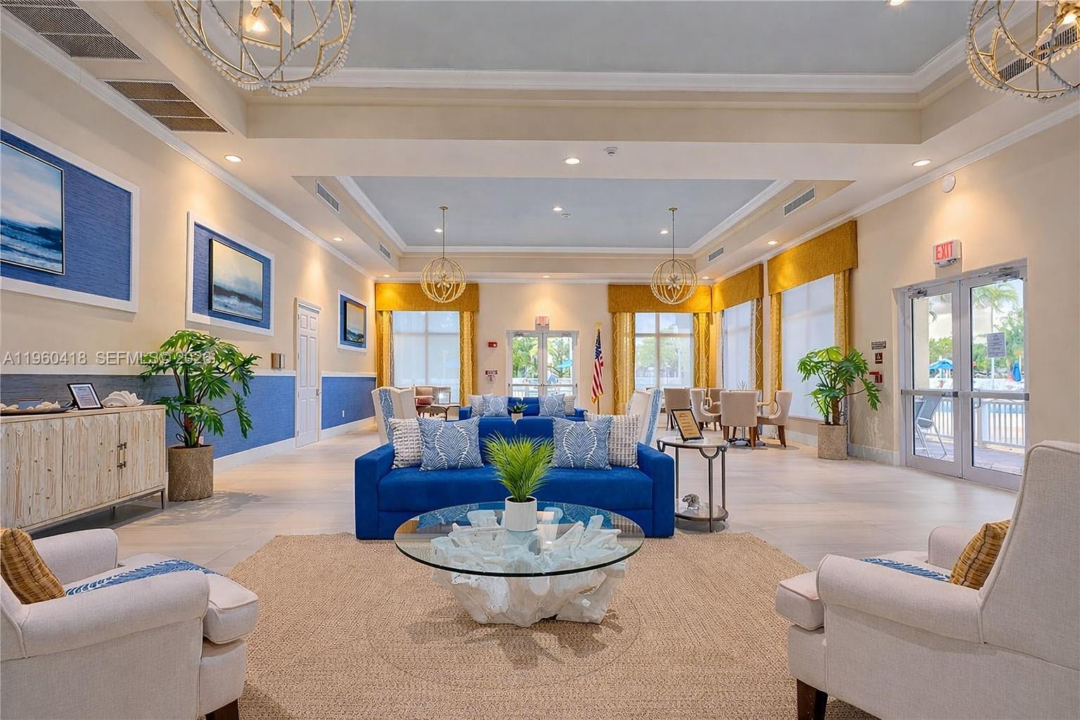 132 Northeast 26th Avenue Homestead, FL 33033 - Photo 64 of 68 a living room with furniture and a large window