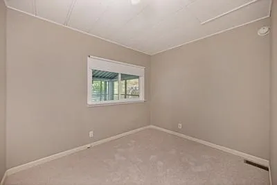 a view of a table and chairs in the patio