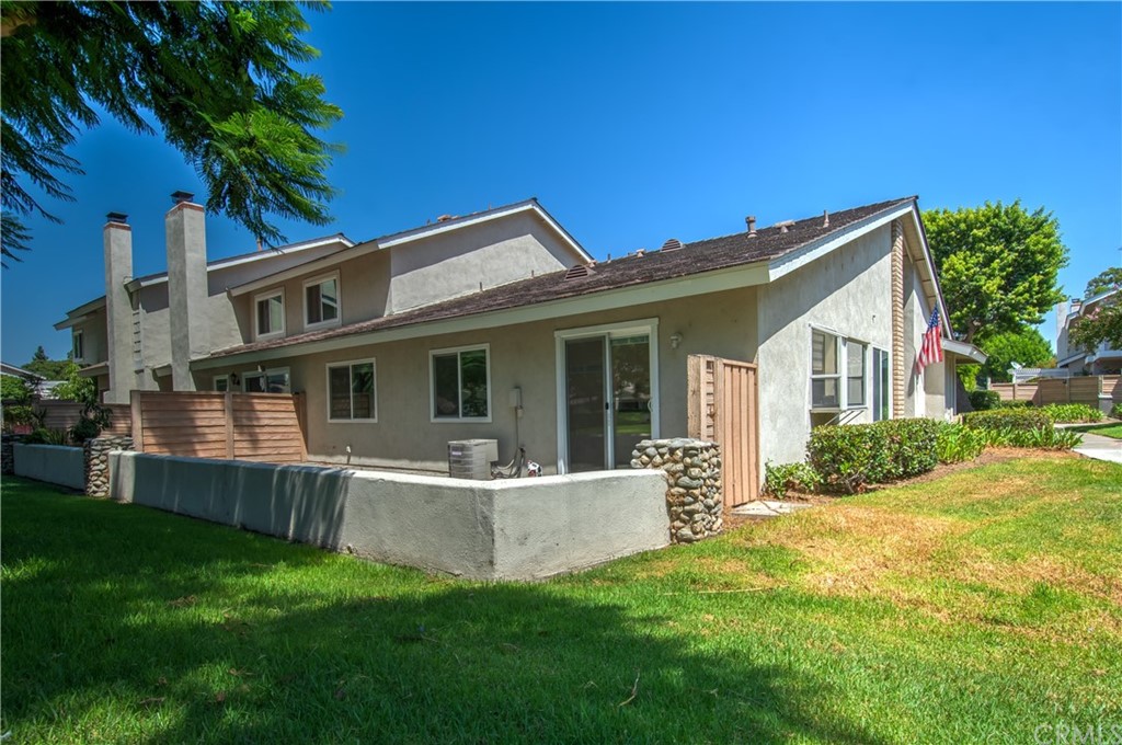 13 Brookmont, Unit 60 Irvine, CA 92604 - Photo 2 of 49 a view of a house with a yard and porch
