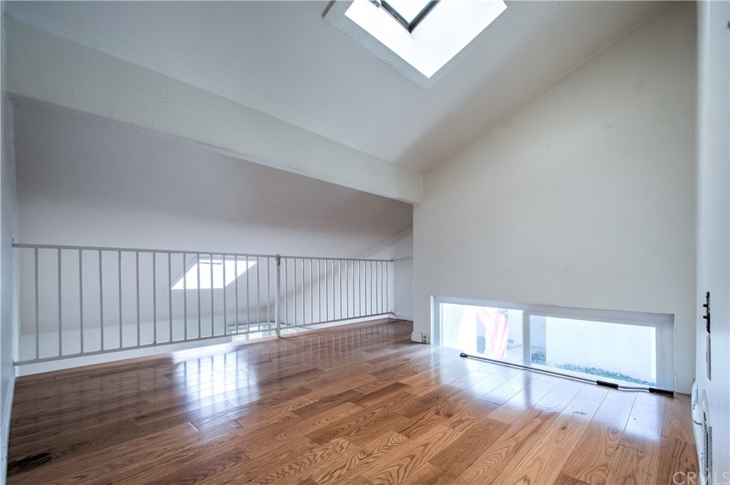 13 Brookmont, Unit 60 Irvine, CA 92604 - Photo 30 of 49 a view of empty room with wooden floor