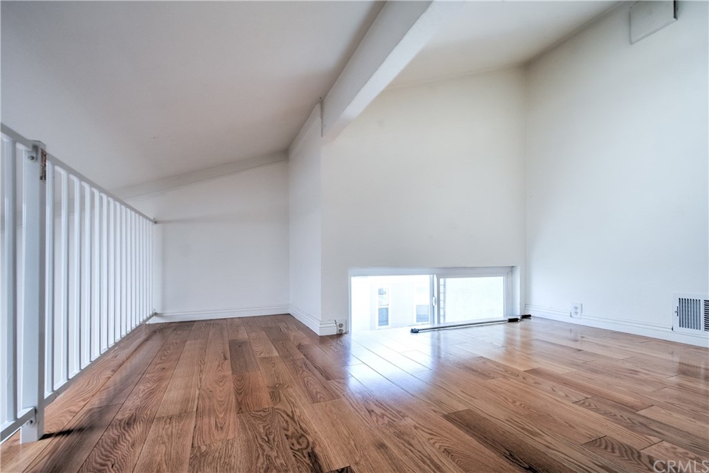 13 Brookmont, Unit 60 Irvine, CA 92604 - Photo 32 of 49 a view of empty room with wooden floor