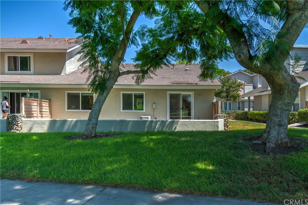 13 Brookmont, Unit 60 Irvine, CA 92604 - Photo 36 of 49 a front view of house with yard and green space