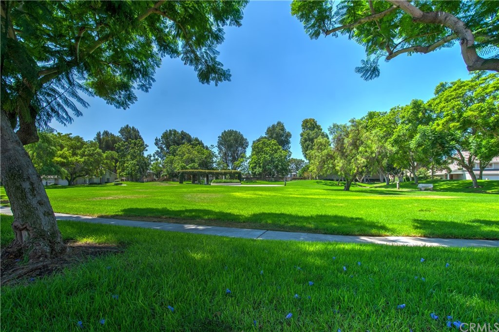 13 Brookmont, Unit 60 Irvine, CA 92604 - Photo 42 of 49 a view of a golf course with a garden