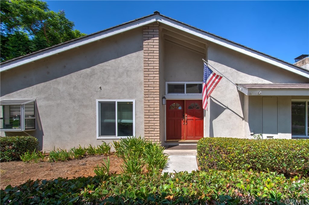 13 Brookmont, Unit 60 Irvine, CA 92604 - Photo 5 of 49 a view of a house with a yard
