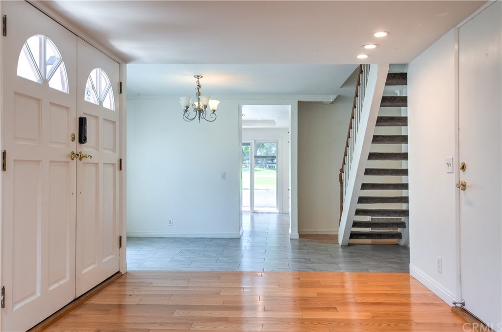 13 Brookmont, Unit 60 Irvine, CA 92604 - Photo 6 of 49 a view of entryway with wooden floor
