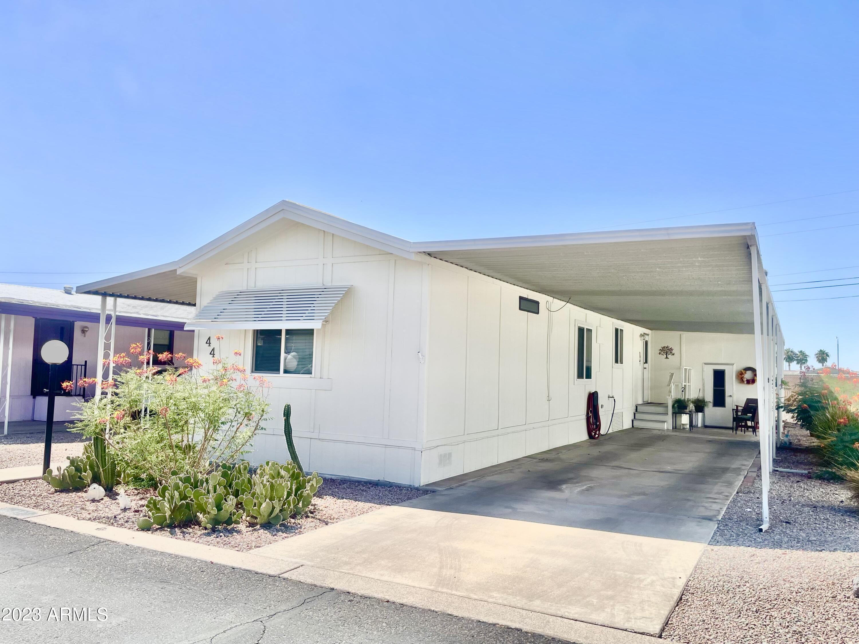 652 South Ellsworth Road, Unit 44 Mesa, AZ 85208 - Photo 2 of 27 PUEBLO44SIDEFRONT