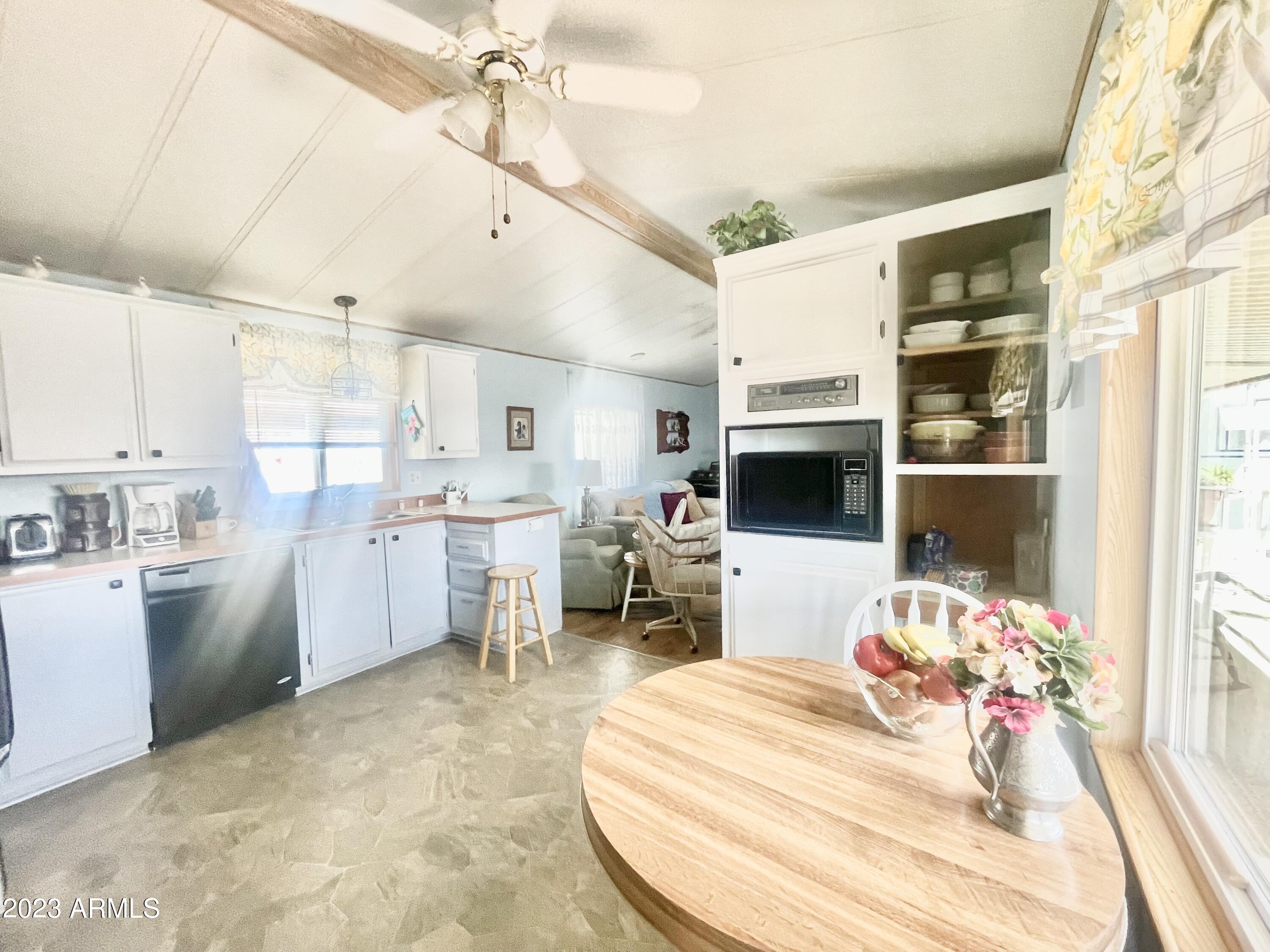 652 South Ellsworth Road, Unit 44 Mesa, AZ 85208 - Photo 7 of 27 PUEBLO44KITCHENTABLE