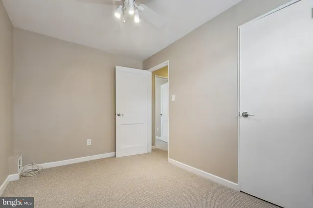 an empty room with a bathroom