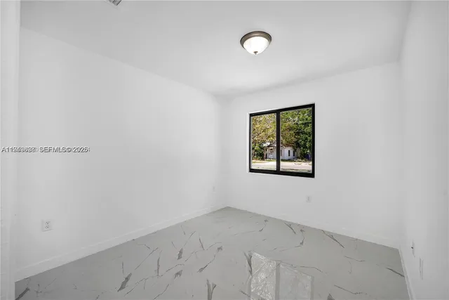 an empty room with a window