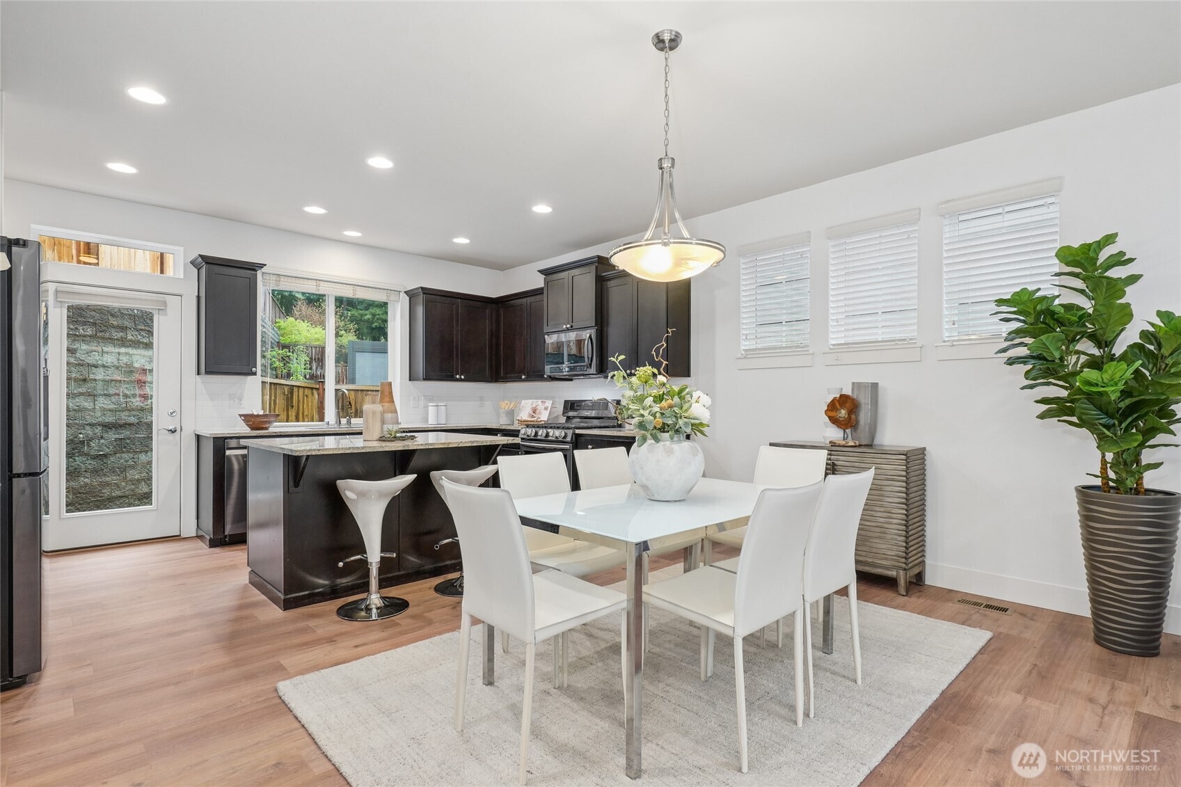 12823 65th Place West Edmonds, WA 98026 - Photo 14 of 32 a view of a dining room with furniture