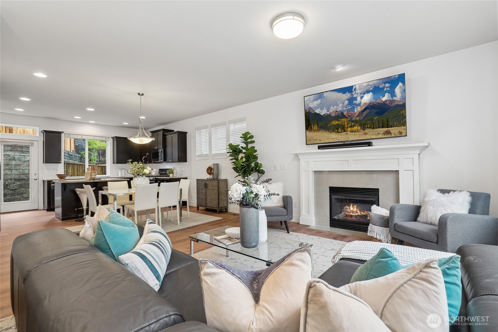 12823 65th Place West Edmonds, WA 98026 - Photo 19 of 32 a living room with furniture fireplace and a flat screen tv
